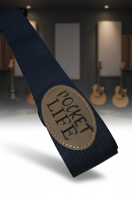 Pocket Life guitar strap with a professional music-studio background